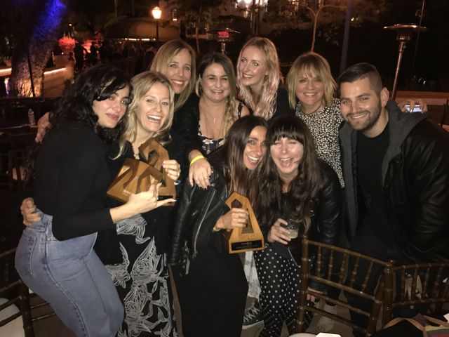 The Billabong Women's team celebrating their three SIMA Awards after the ceremony