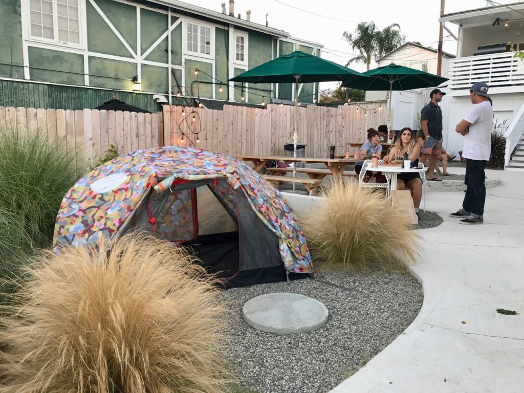 Poler set up one of its tents at the entrance to the store. Shop-eat-surf photos.